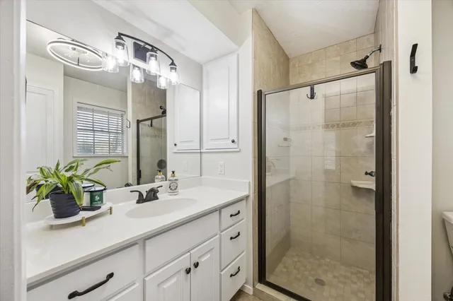 a living room with furniture and windows
