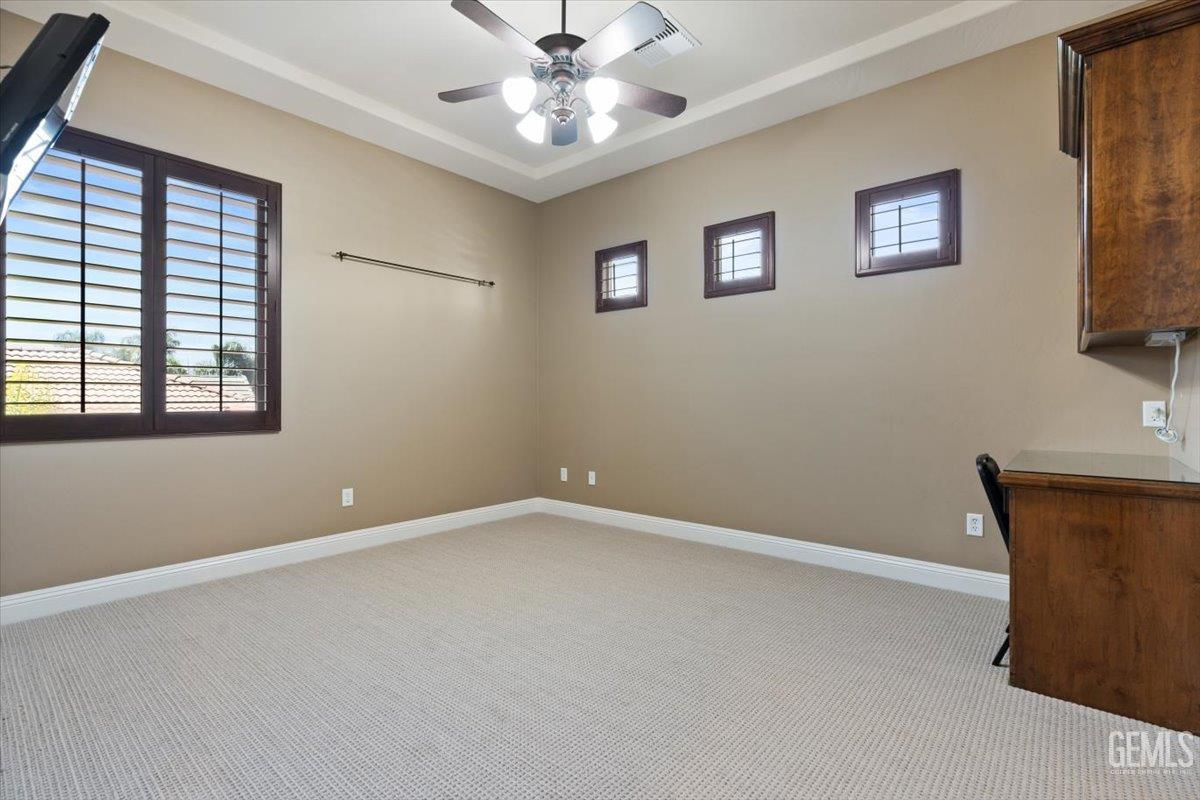 Undisclosed Address Bakersfield, CA 93311 - Photo 18 of 41 a view of an empty room with a window