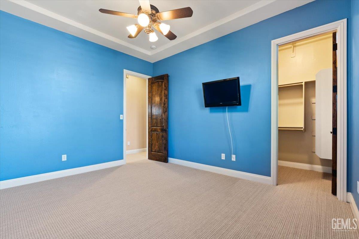 Undisclosed Address Bakersfield, CA 93311 - Photo 21 of 41 en empty room with windows and closet