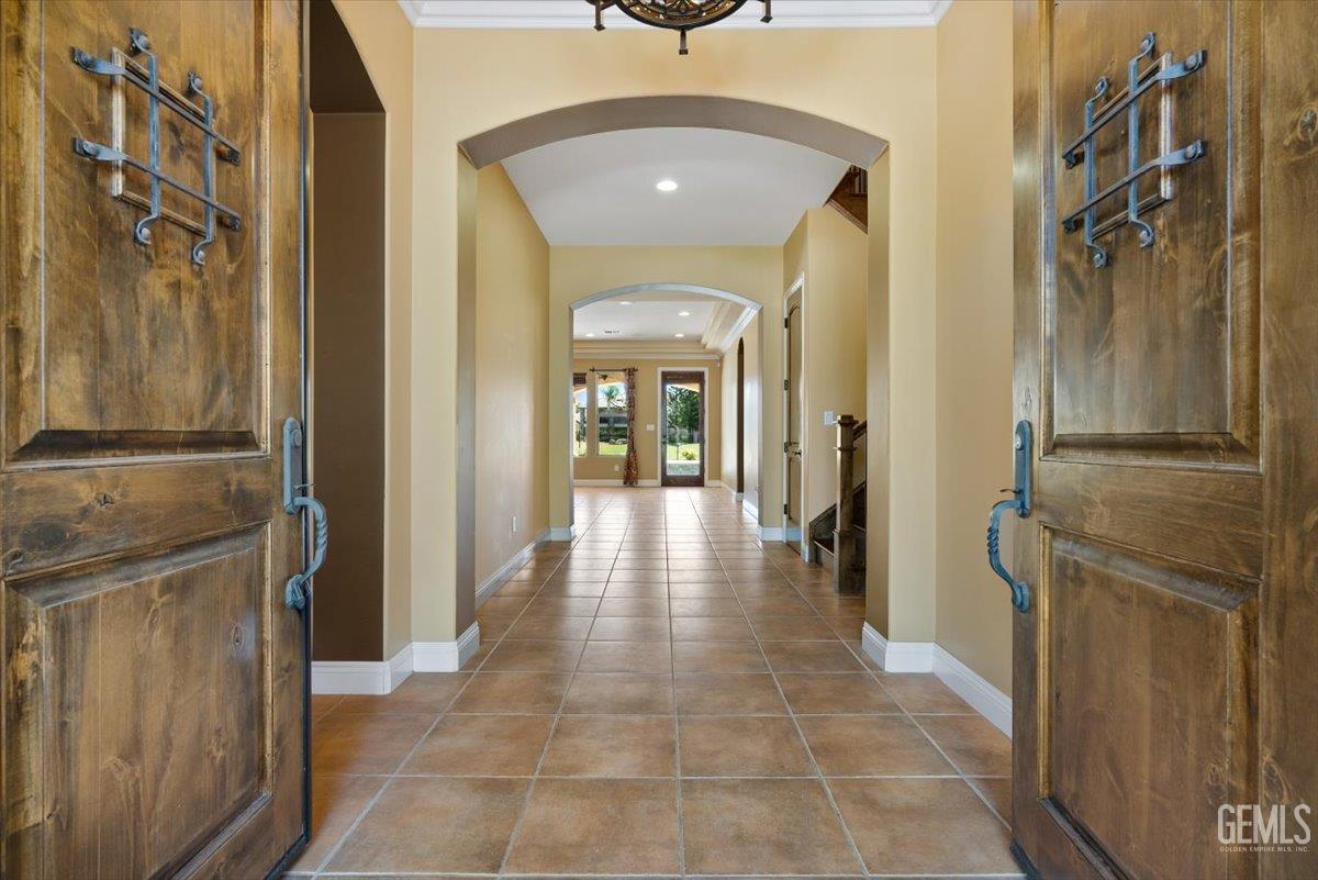 Undisclosed Address Bakersfield, CA 93311 - Photo 4 of 41 a hallway with sliding door and entryway