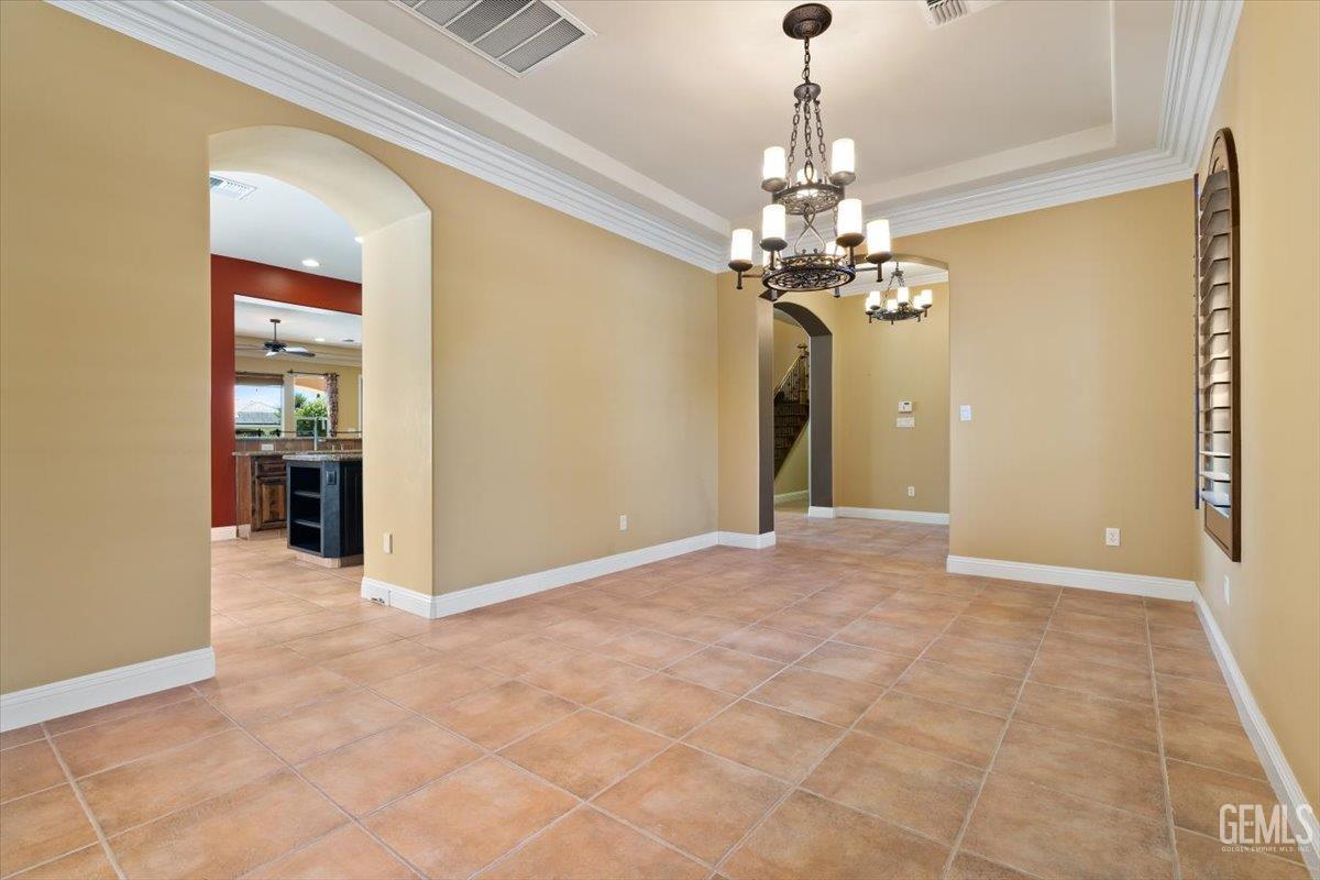 Undisclosed Address Bakersfield, CA 93311 - Photo 9 of 41 a view of a chandelier in a room