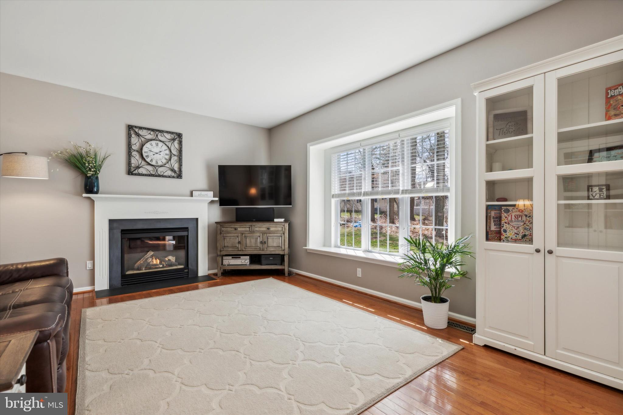 4 Waters Road Malvern, PA 19355 - Photo 12 of 26 Family Room with window seat and propane Fireplace