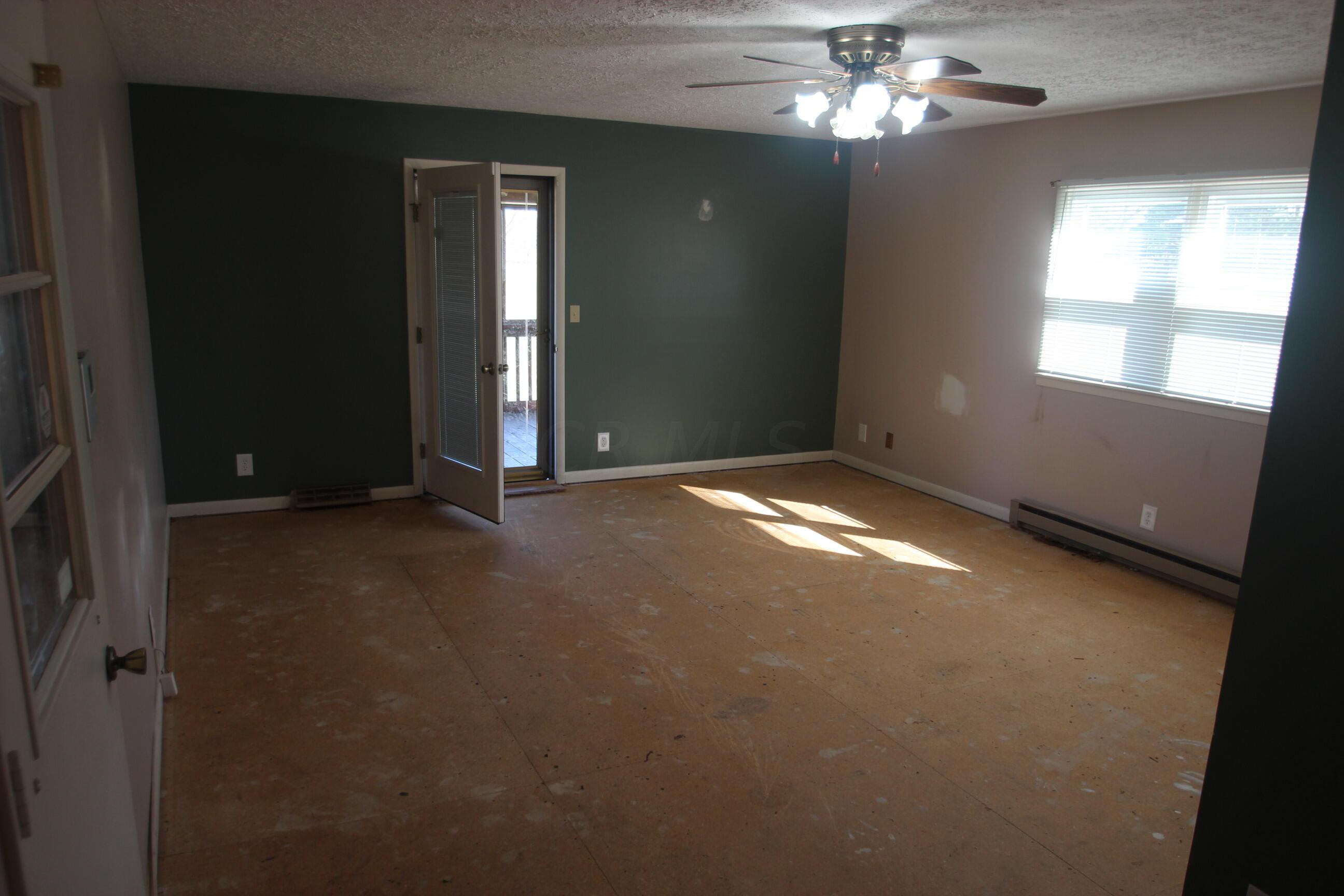 540 Newmans-Cardington Road West Prospect, OH 43342 - Photo 32 of 41 Family room from kitchen and back door.