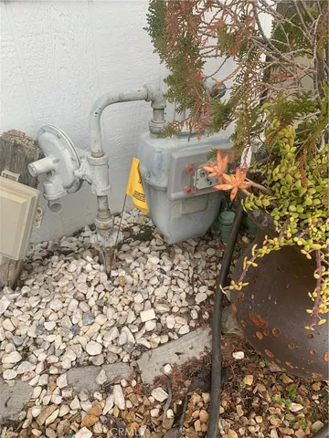 a view of a backyard of the house