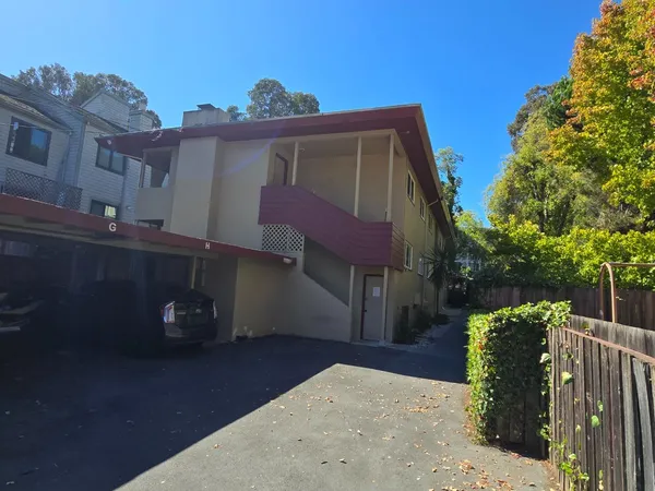 a view of a house with a street