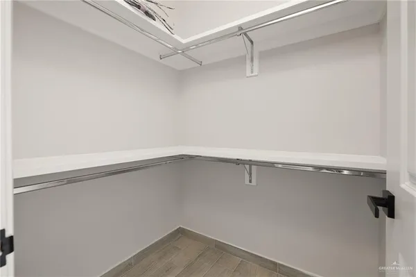 a view of a room with racks on the wall