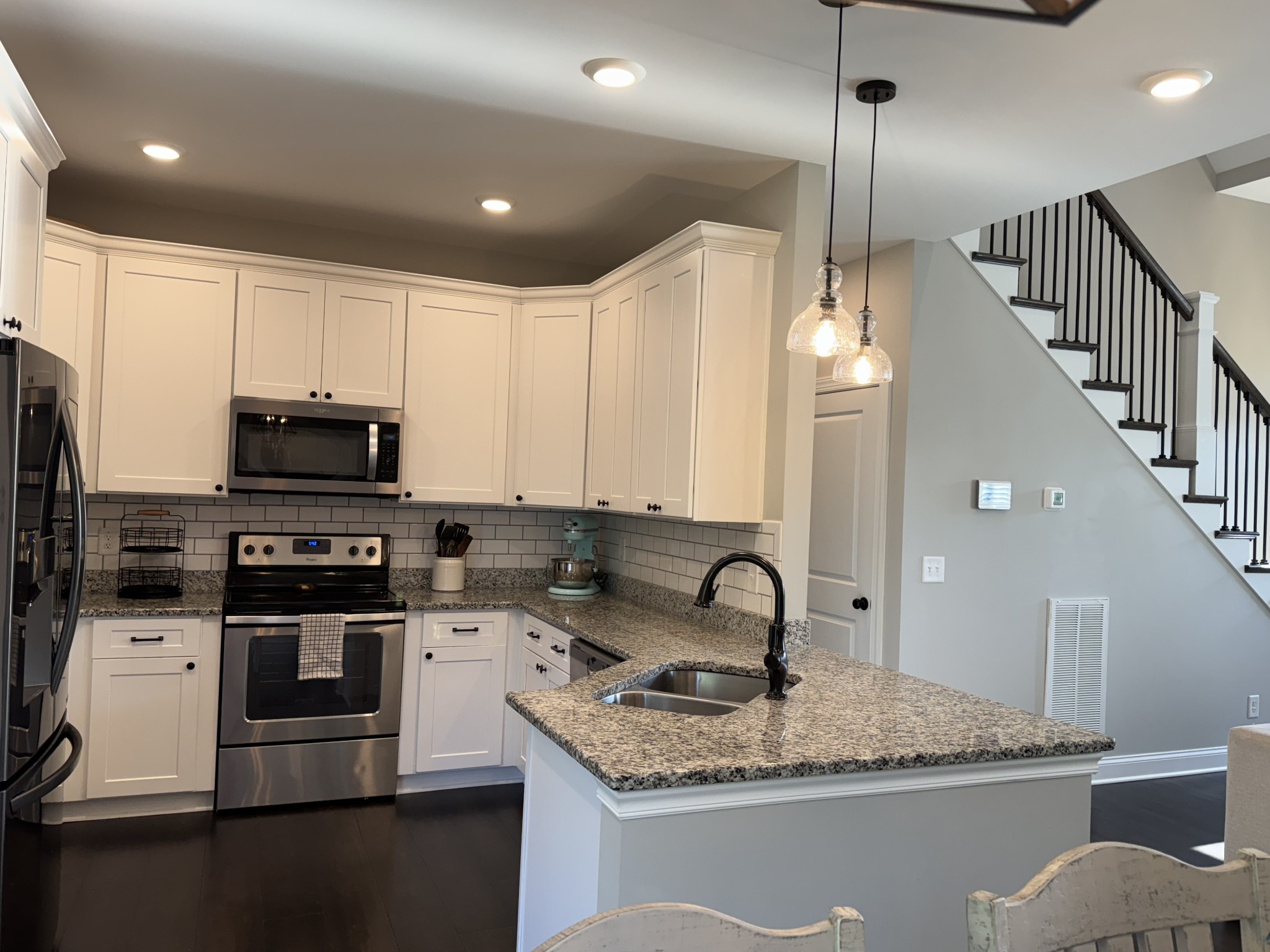 344 Brandywine Lane Springfield, TN 37172 - Photo 12 of 30 a kitchen with stainless steel appliances granite countertop a sink a stove and a refrigerator