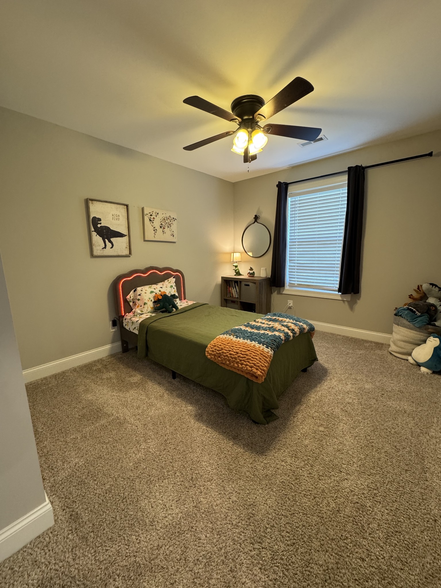 344 Brandywine Lane Springfield, TN 37172 - Photo 15 of 30 a spacious bedroom with a bed and a ceiling fan