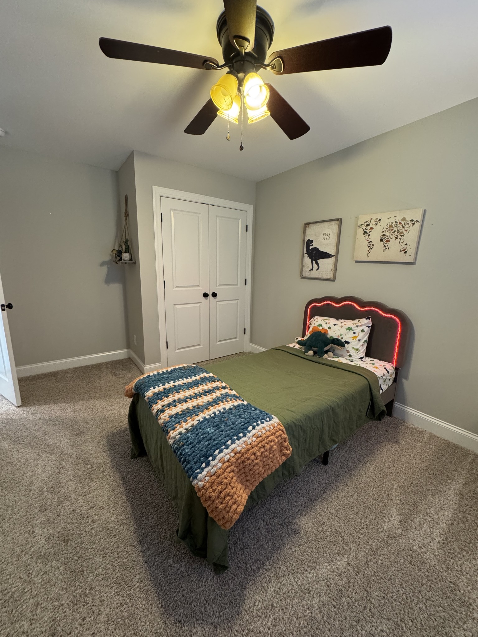 344 Brandywine Lane Springfield, TN 37172 - Photo 16 of 30 a bedroom with a bed and a chandelier