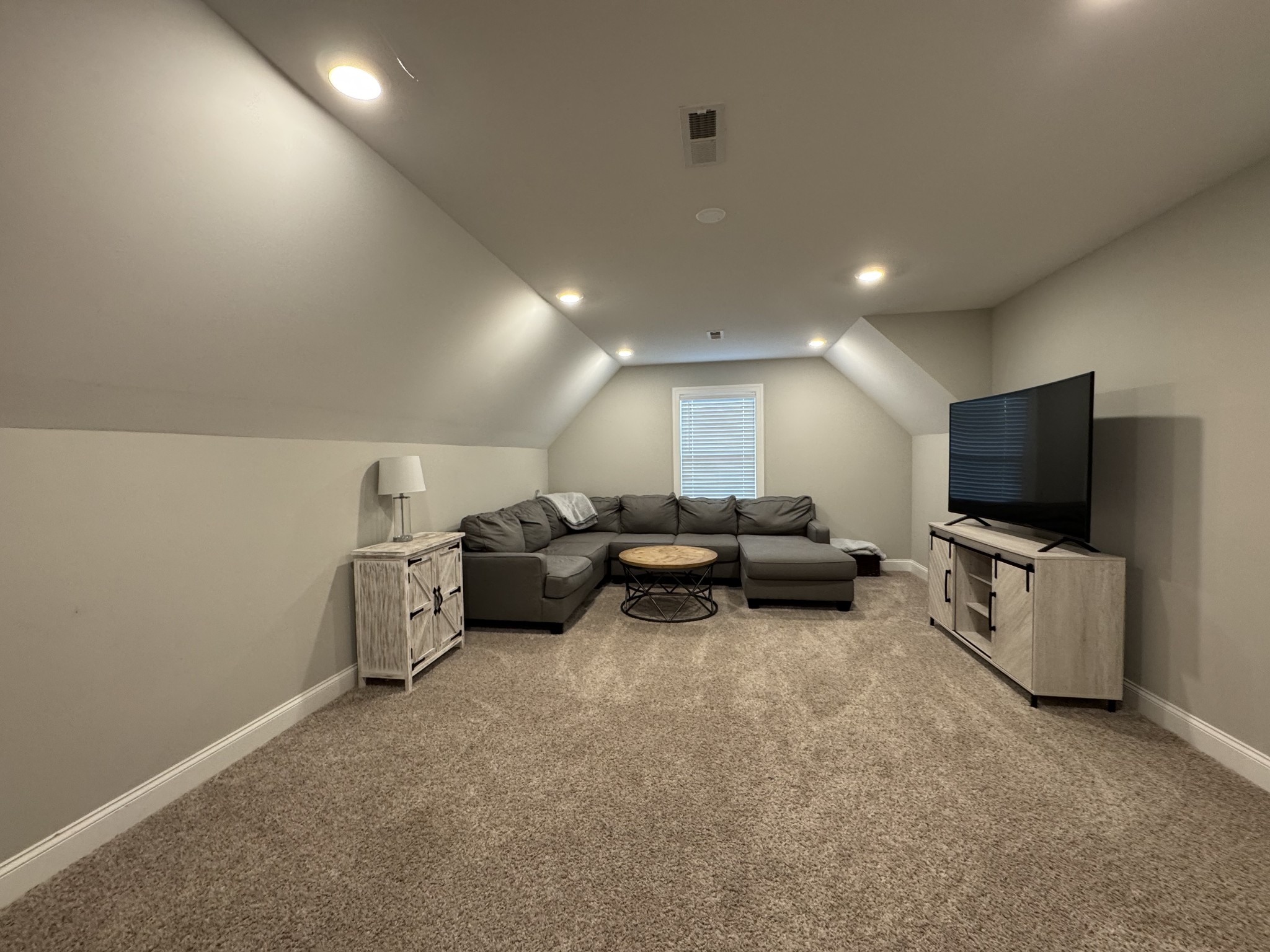 344 Brandywine Lane Springfield, TN 37172 - Photo 23 of 30 a living room with furniture and a flat screen tv