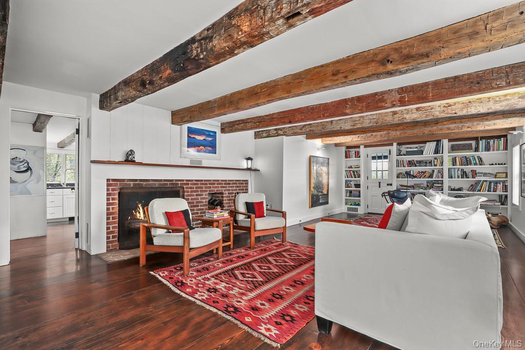 56 Northrup Road Dover Plains, NY 12522 - Photo 12 of 46 a living room with furniture and a fireplace