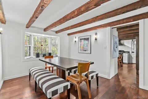 a room with chairs and a wooden floor