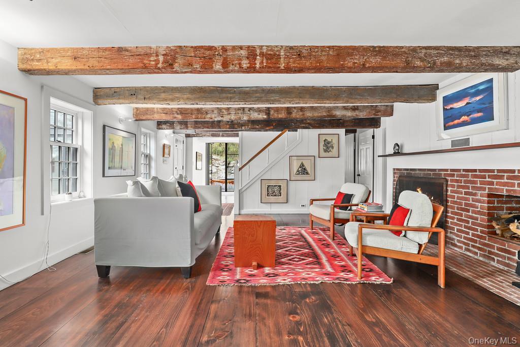 56 Northrup Road Dover Plains, NY 12522 - Photo 14 of 46 a living room with furniture and a fireplace