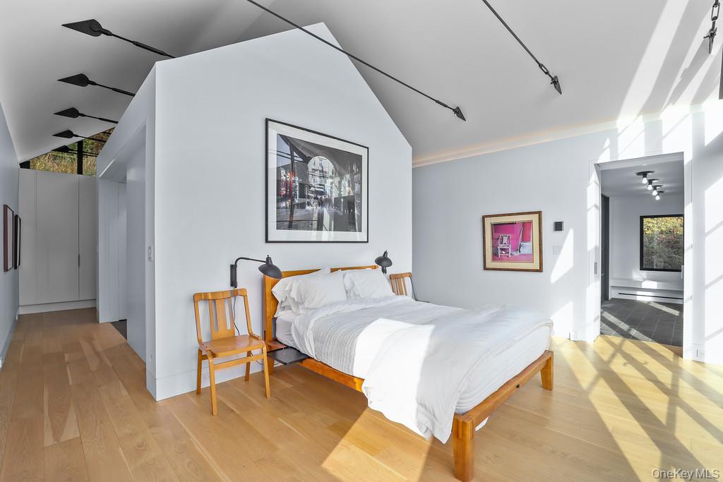 56 Northrup Road Dover Plains, NY 12522 - Photo 24 of 46 a bed room with a bed and a couch