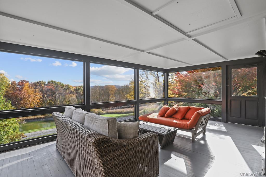 56 Northrup Road Dover Plains, NY 12522 - Photo 36 of 46 a outdoor living space with furniture and a floor to ceiling window