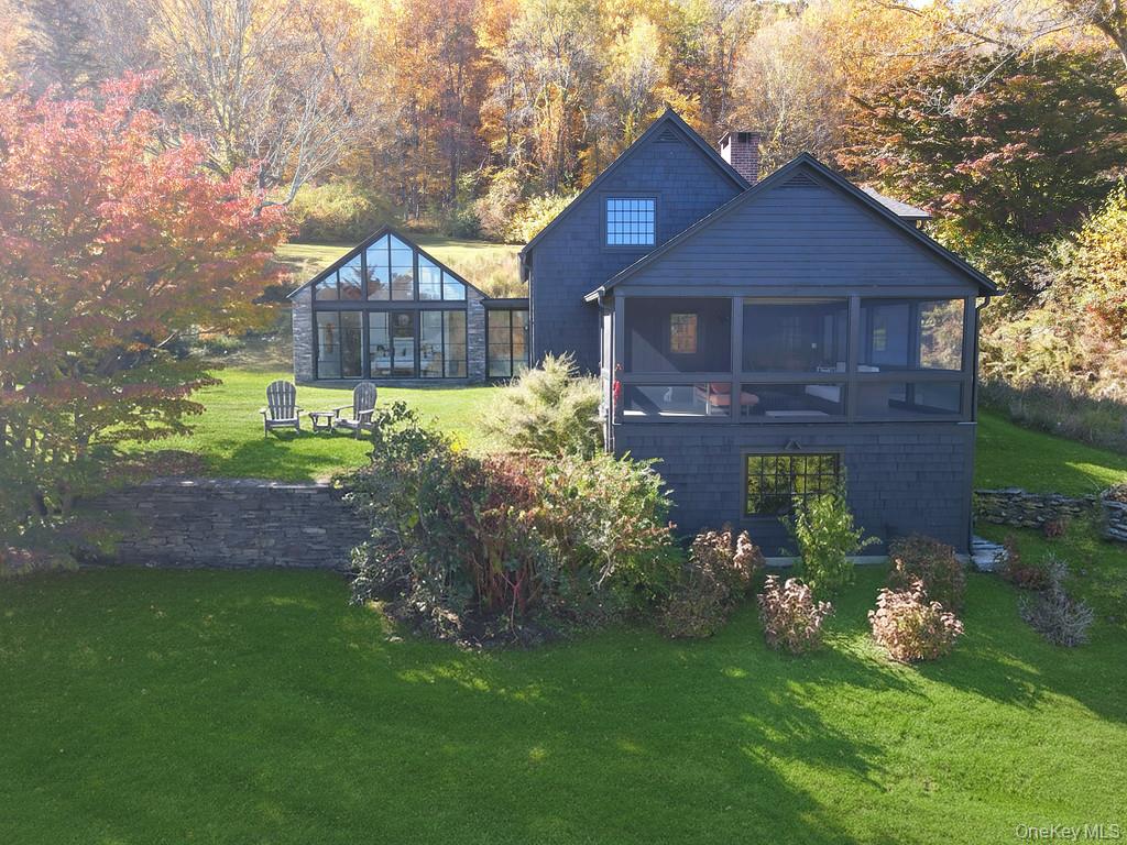 56 Northrup Road Dover Plains, NY 12522 - Photo 39 of 46 a front view of a house with garden