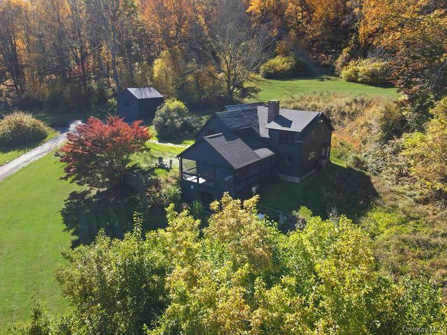 a view of a lake with a house