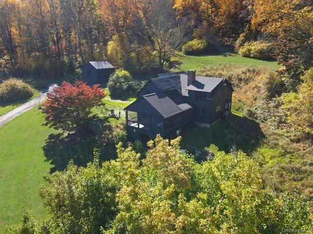 a view of a lake with a house