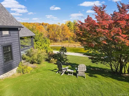 a view of a lake with a big yard