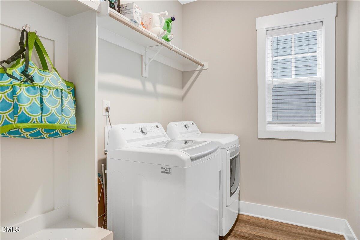 1105 Logperch Way Wendell, NC 27591 - Photo 18 of 29 a utility room with dryer and washer