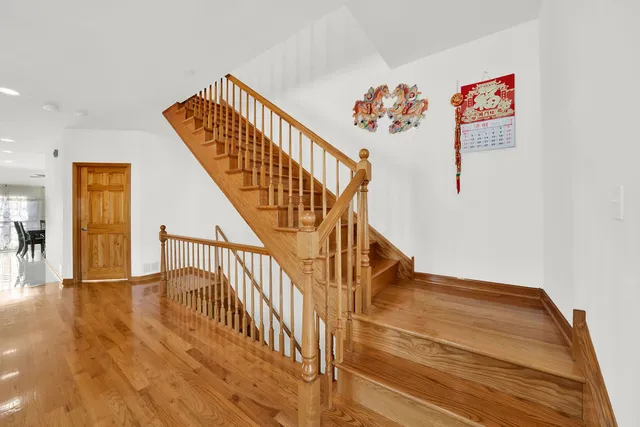 a view of entryway with wooden floor