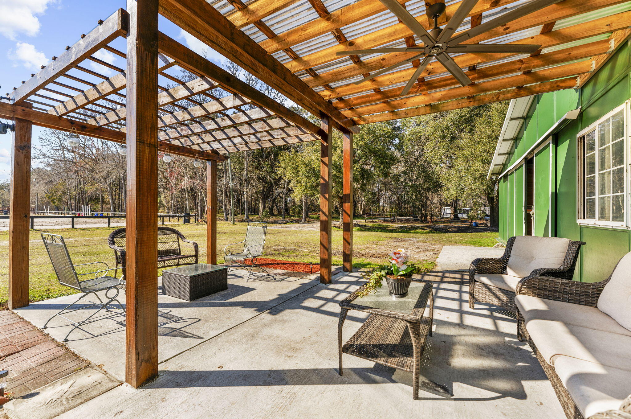 163 Keans Neck Road Seabrook, SC 29940 - Photo 1 of 62 patio in front of barn