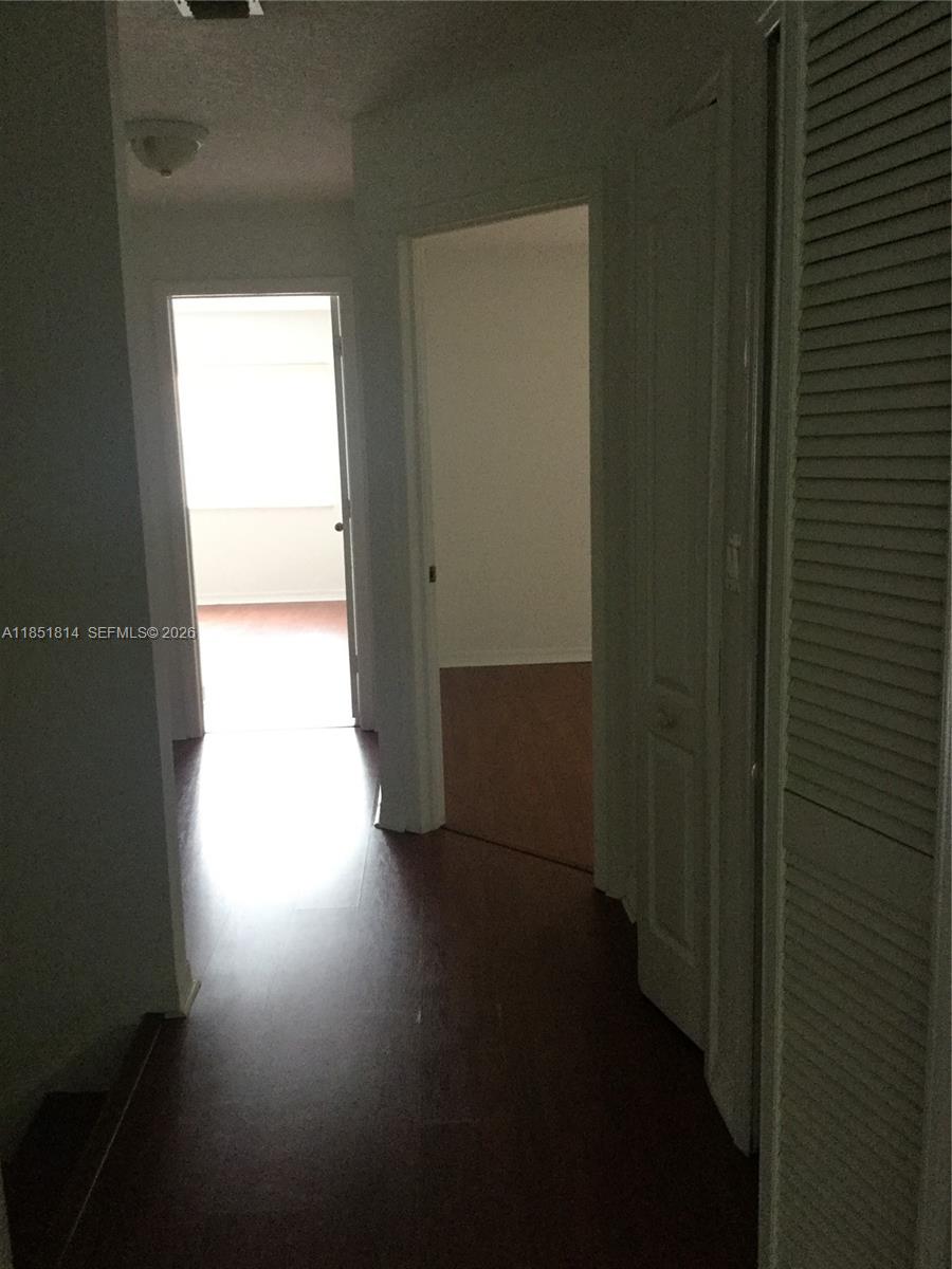 2885 Southwest 127th Avenue Miramar, FL 33027 - Photo 12 of 13 a view of a hallway with wooden floor