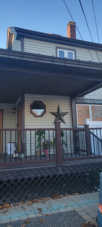11 Walter Street, Unit 2 Boston, MA 02136 - Photo 1 of 26 a view of a house with a porch