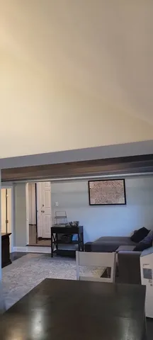 a view of livingroom with furniture and window