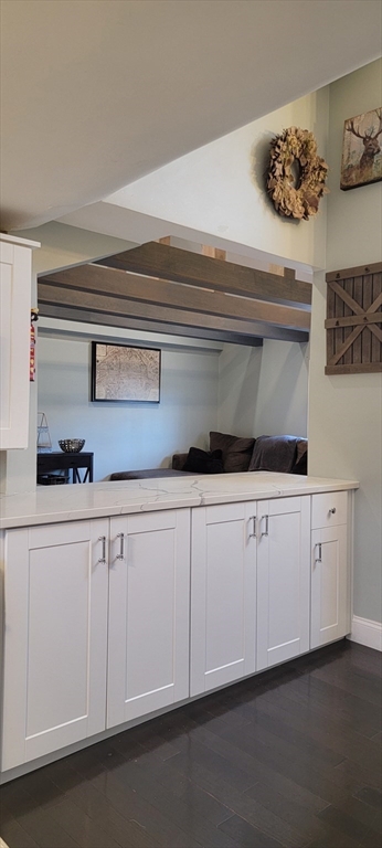 11 Walter Street, Unit 2 Boston, MA 02136 - Photo 9 of 26 a kitchen with white cabinets and sink