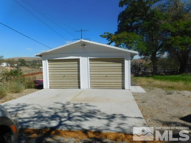 4880 Wayne Drive Sun Valley, NV 89433 - Photo 11 of 11 a front view of a house with a yard
