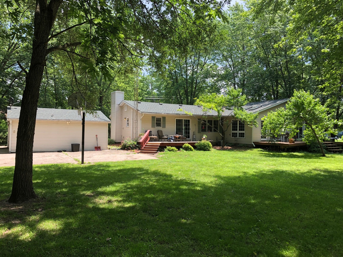 31446 South Kavanaugh Road Wilmington, IL 60481 - Photo 2 of 19 a view of a house with a backyard and a patio