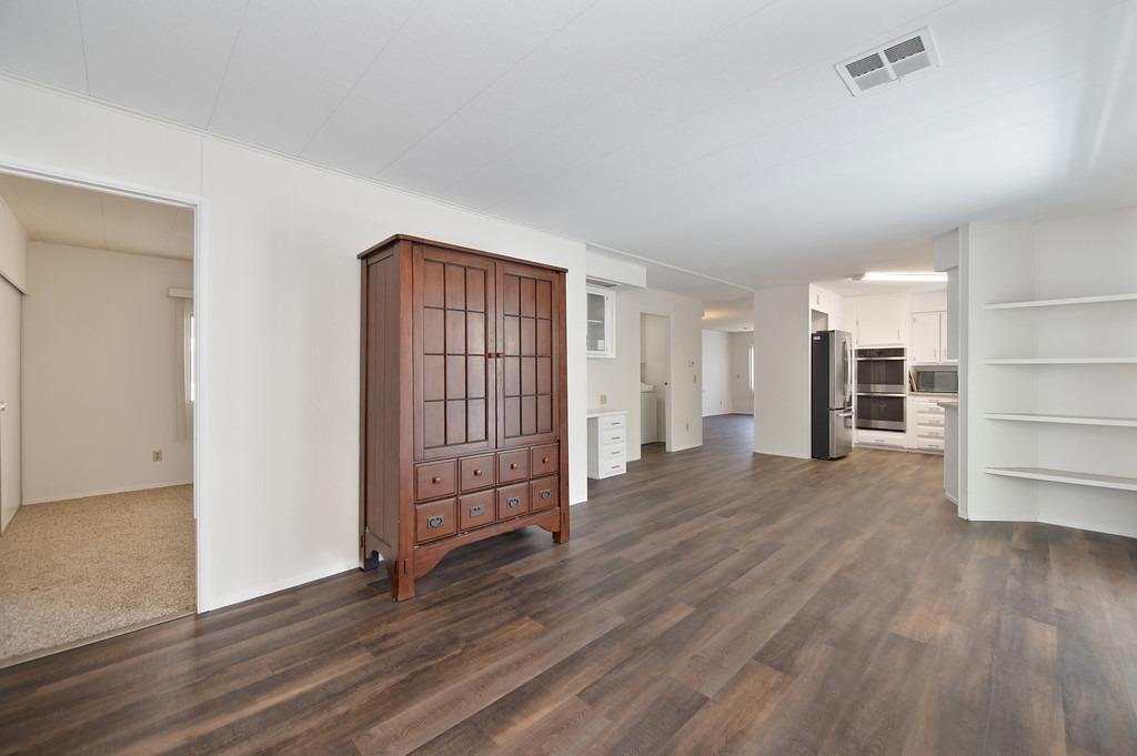 163 Rimma Way Roseville, CA 95661 - Photo 15 of 35 an empty room with wooden floor and closet