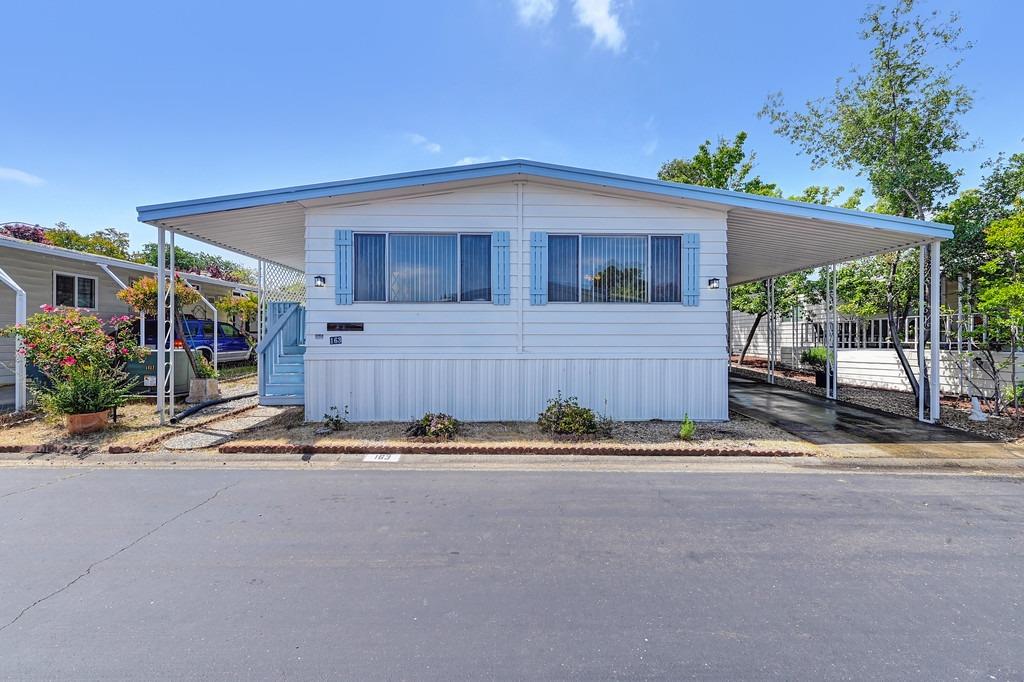 163 Rimma Way Roseville, CA 95661 - Photo 26 of 35 a front view of a house with a yard