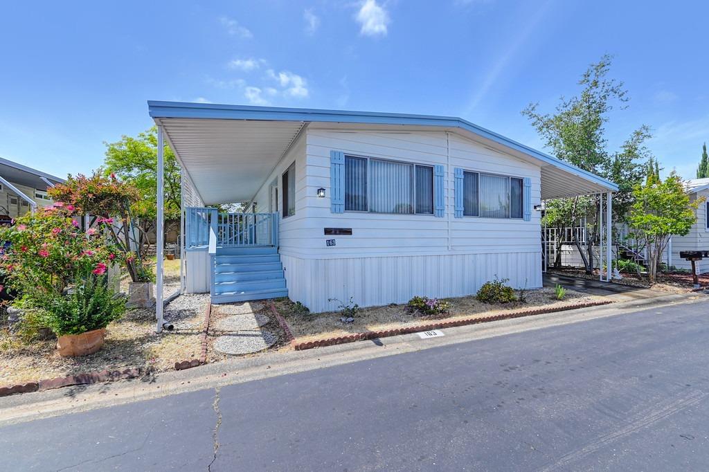 163 Rimma Way Roseville, CA 95661 - Photo 5 of 35 a view of a backyard of the house