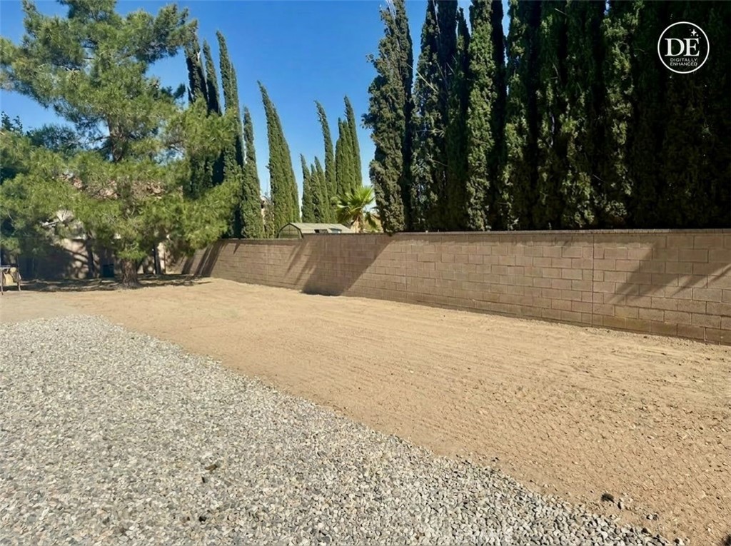 13375 Rincon Road Apple Valley, CA 92308 - Photo 43 of 72 backyard / side of house area w/ AI