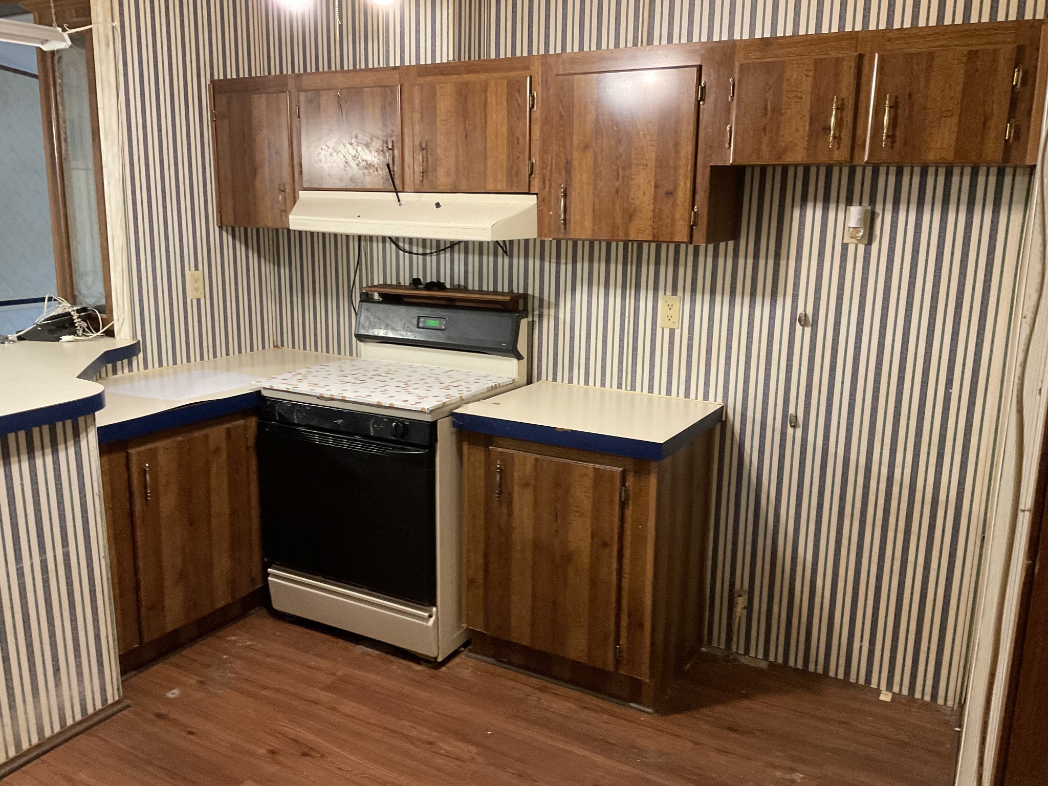 167 Dripping Springs Street Crofton, KY 42217 - Photo 8 of 30 a kitchen with a sink and a microwave
