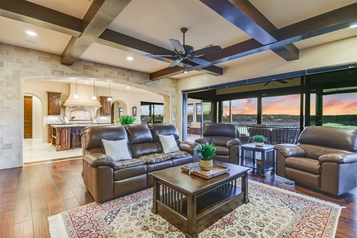 17017 South Ridge Lane Austin, TX 78734 - Photo 13 of 28 a living room with furniture a rug potted plant and a large window