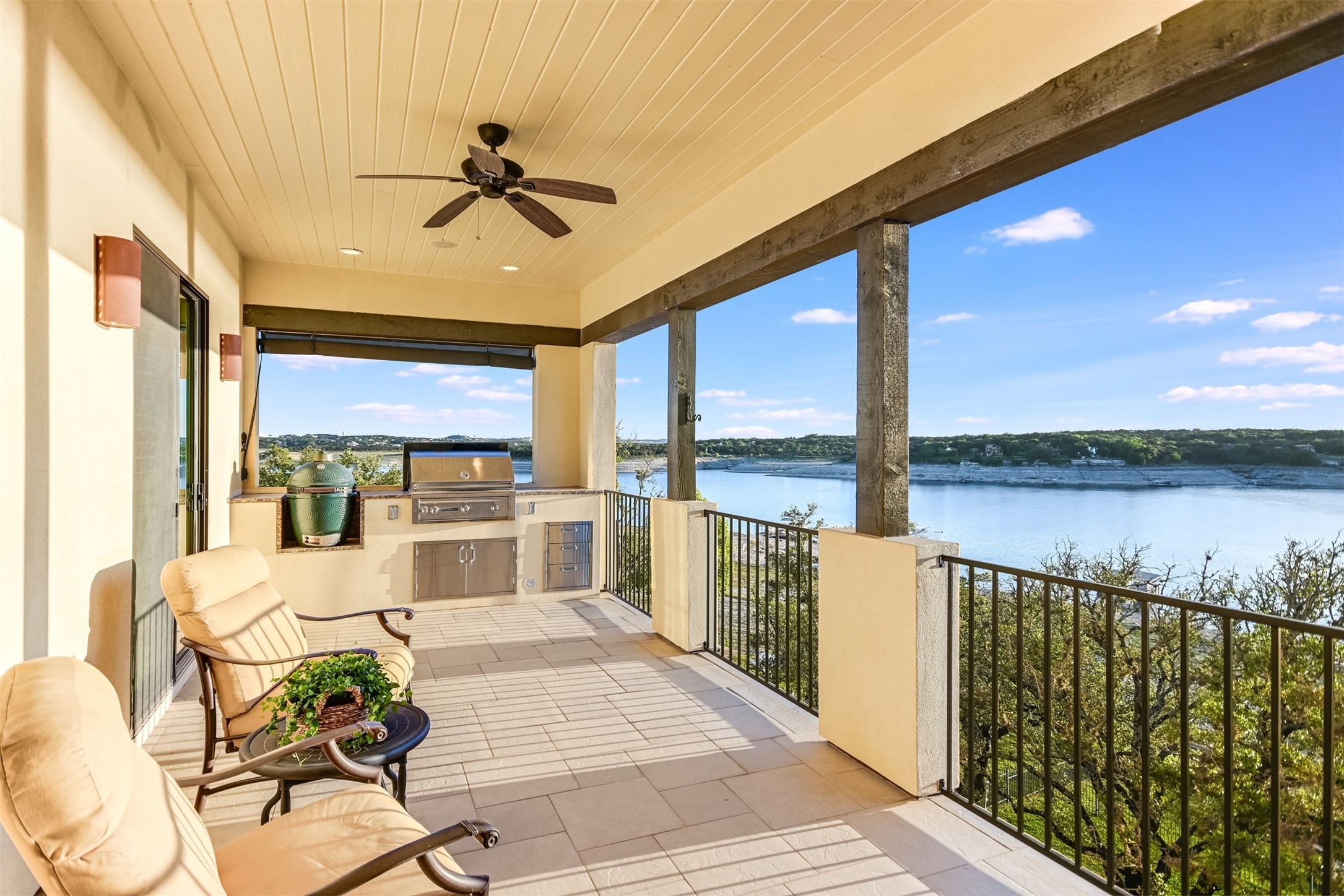 17017 South Ridge Lane Austin, TX 78734 - Photo 17 of 28 a view of a balcony dining table and chairs with wooden floor