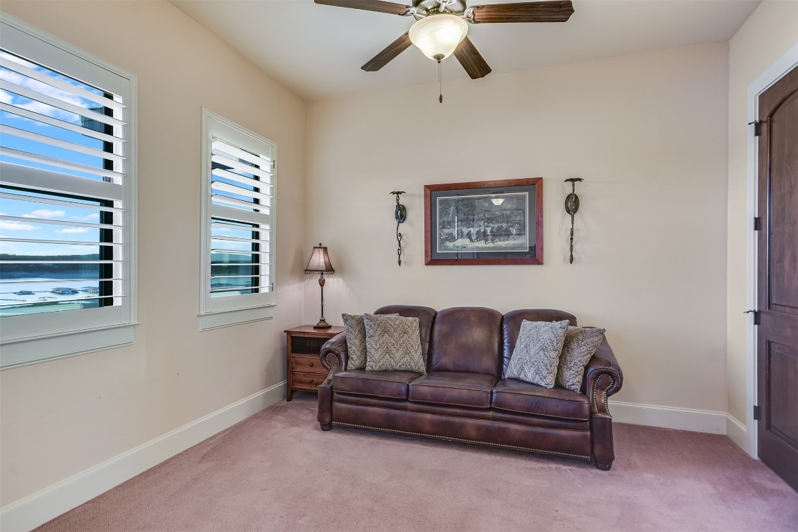 17017 South Ridge Lane Austin, TX 78734 - Photo 22 of 28 a living room with furniture and a window