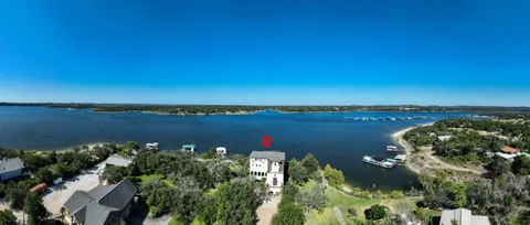 a view of a lake with a city view