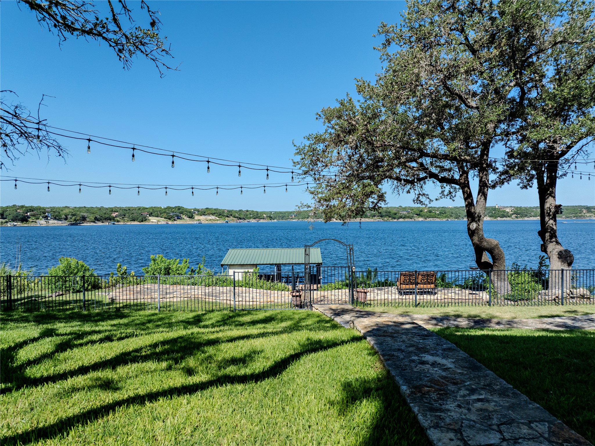 17017 South Ridge Lane Austin, TX 78734 - Photo 8 of 28 a view of a swimming pool with a yard