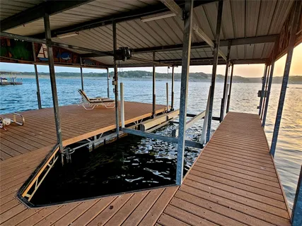 a view of a balcony with chairs