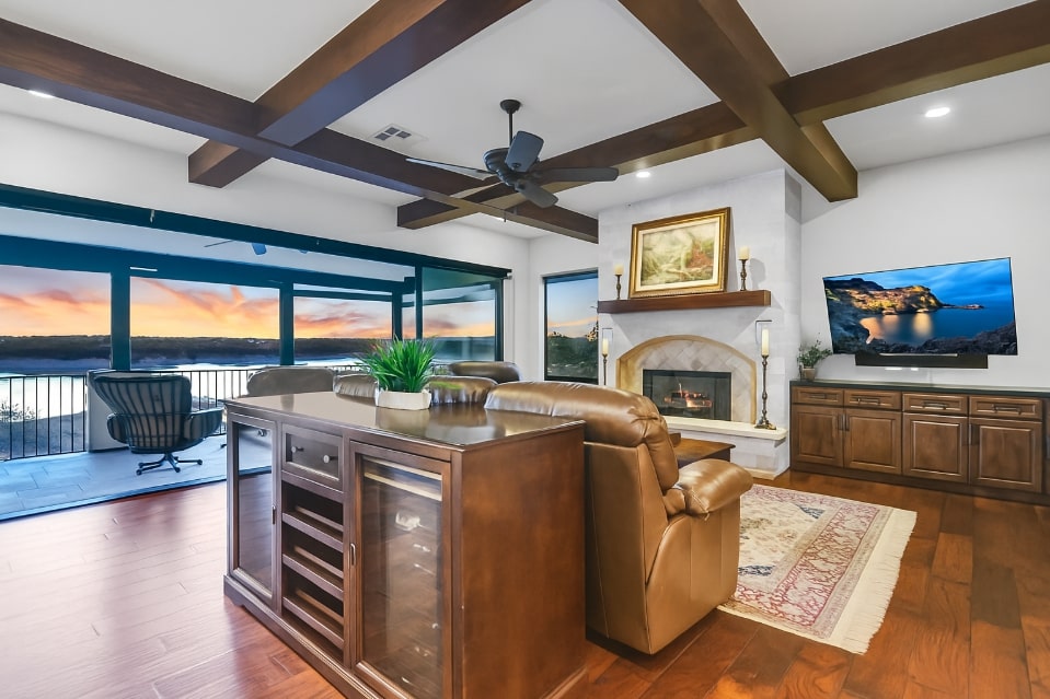 17017 South Ridge Lane Austin, TX 78734 - Photo 10 of 28 a living room with fireplace furniture and a flat screen tv