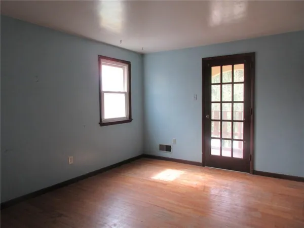 an empty room with windows