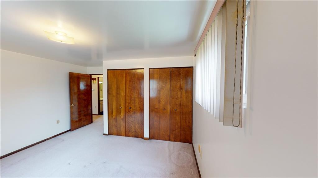 130 Country Club Road Butler, PA 16002 - Photo 17 of 38 an empty room with windows