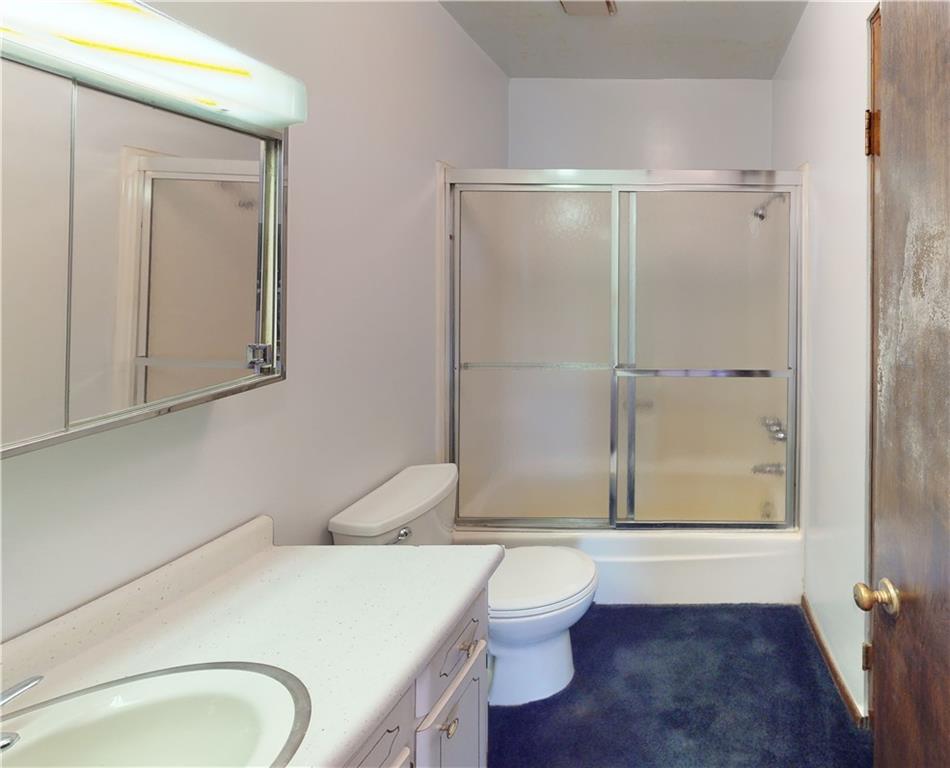 130 Country Club Road Butler, PA 16002 - Photo 20 of 38 a bathroom with a sink a toilet and shower