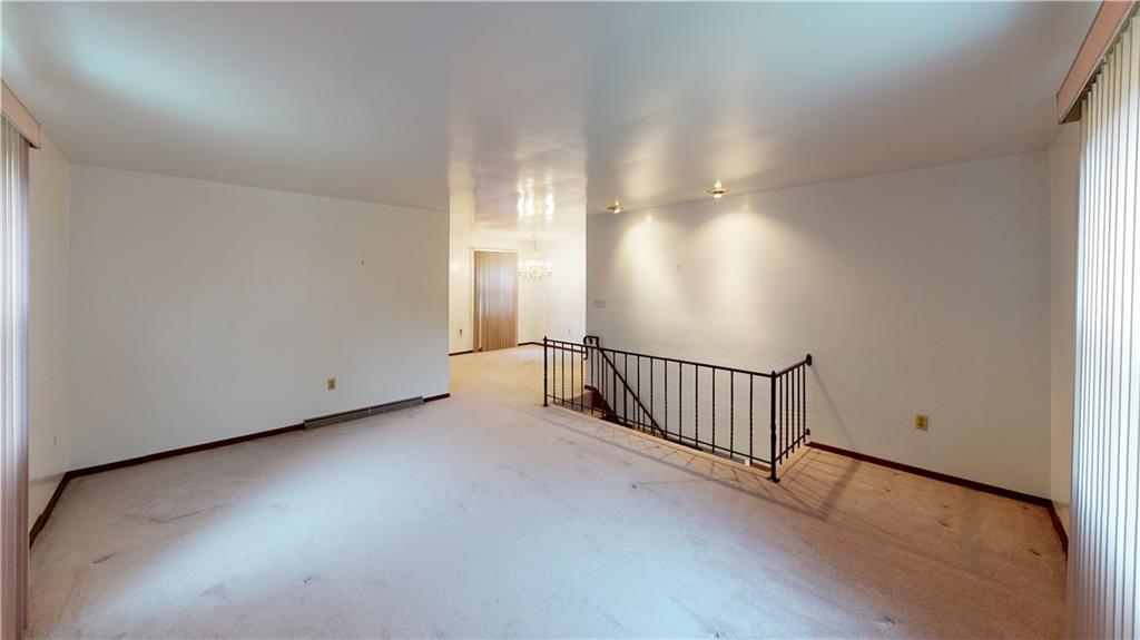 130 Country Club Road Butler, PA 16002 - Photo 8 of 38 a view of a room with stairs and a window