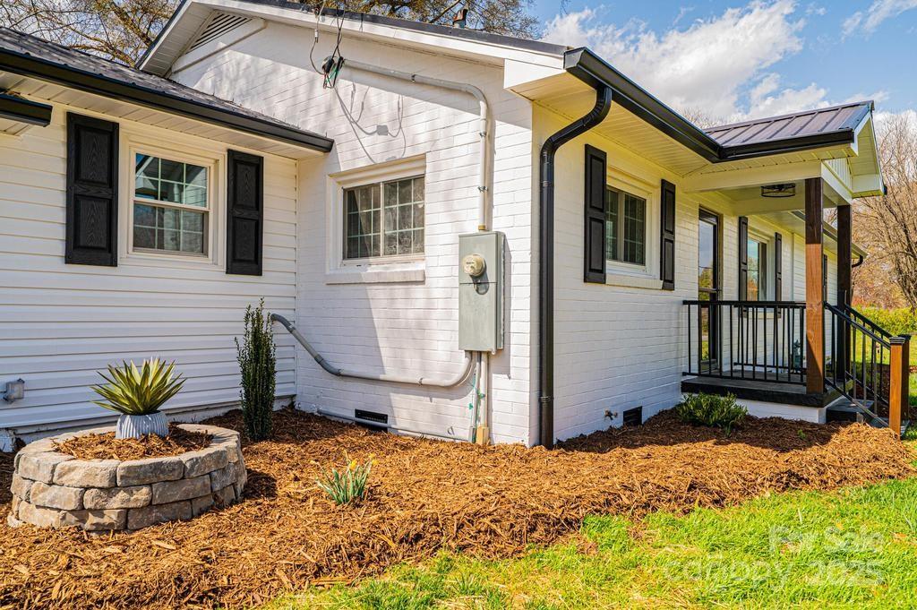 1993 Moss Farm Road Hickory, NC 28602 - Photo 11 of 41 a view of a house with a small porch