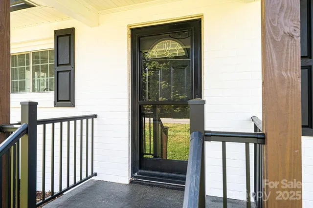 a view of a porch of a house